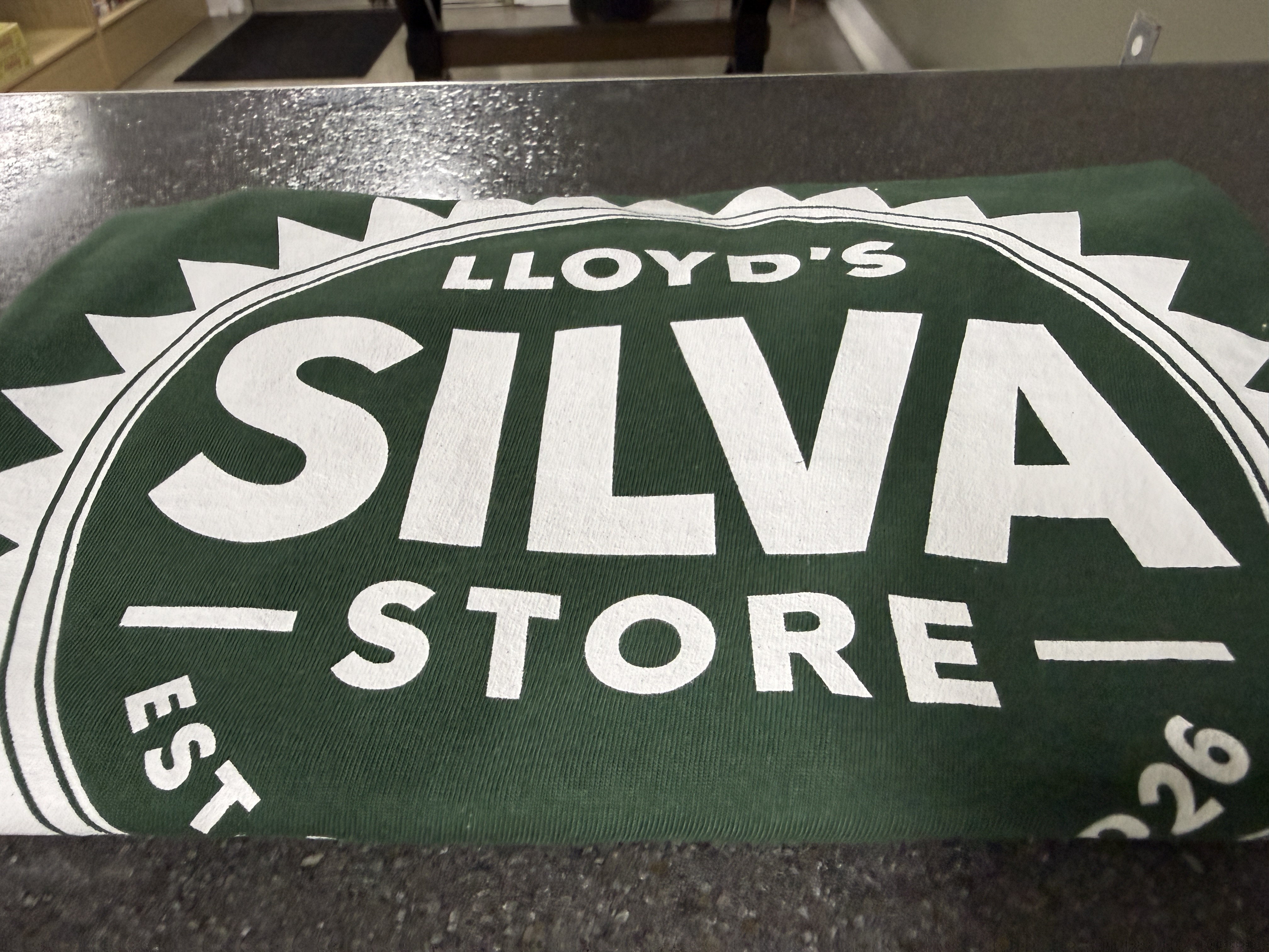 Lloyd's Silva Store t-shirt logo close-up